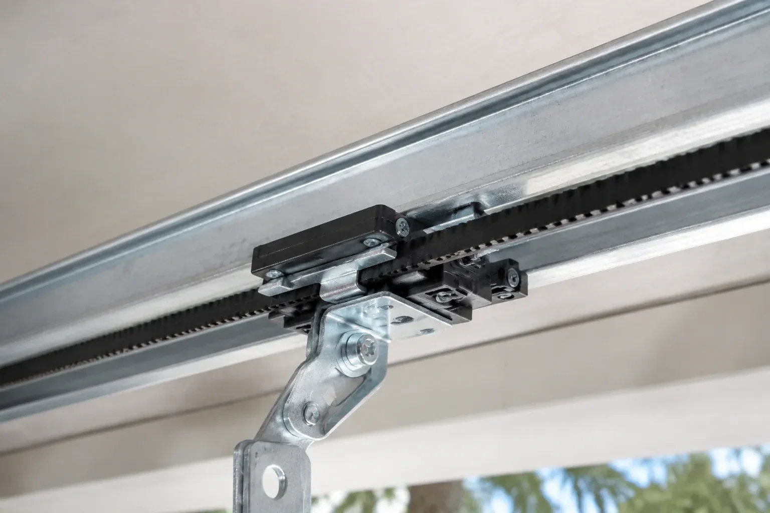 Illustrative garage doors scene; not an actual job — Belt-Drive Opener Repair, Springwater